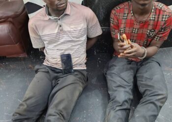TWO COUSINS ARMED-ROBBERY GANG IN POLICE NET FOR MURDER